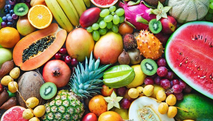 assortment-of-colorful-ripe-tropical-fruits-top-royalty-free-image-995518546-1564092355-816049